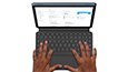 Overhead of the IdeaPad Duet Chromebook laptop with hands typing