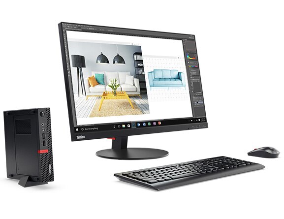 Lenovo ThinkCentre M910x Tiny positioned vertically in stand, along with monitor, keyboard, and mouse