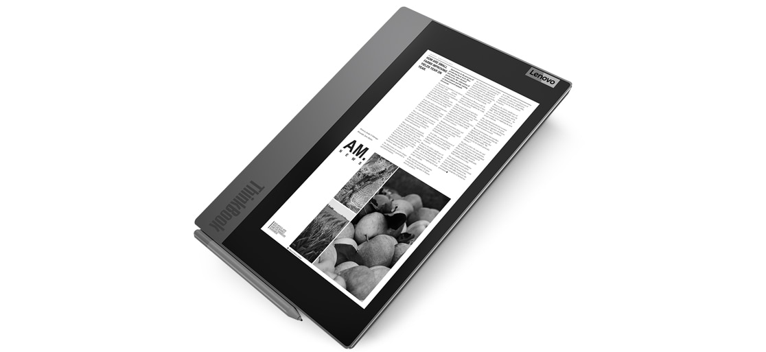 Lenovo ThinkBook Plus closed, showing display on top cover and digital pen.. 