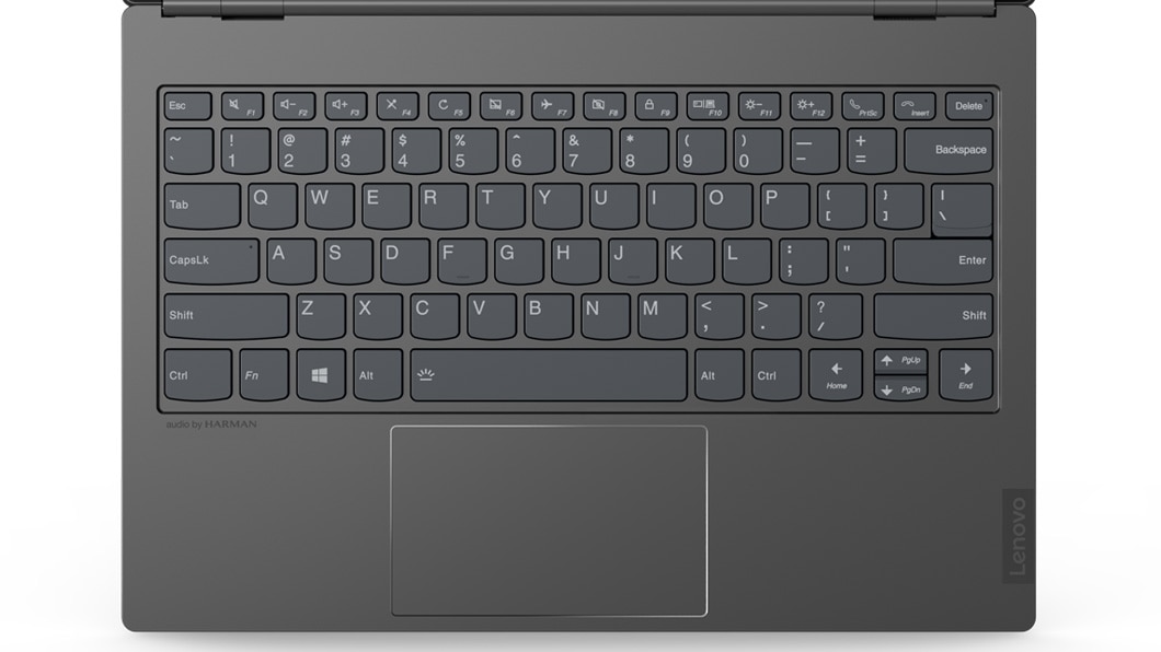 Overhead shot of keyboard, trackpad, and Harman Kardon® audio stamp on the Lenovo ThinkBook Plus.