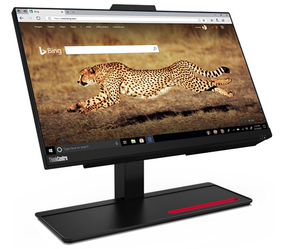 Un ThinkCentre M70a en ángulo mostrando una página de búsqueda de Bing y un guepardo en la pantalla