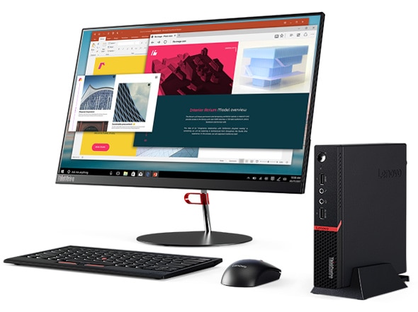 Lenovo ThinkCentre M715q Thin Client positioned vertically, alongside monitor, keyboard, and mouse.