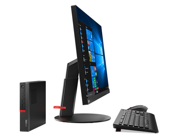 Lenovo ThinkCentre M920x Tiny, front view next to monitor and keyboard.