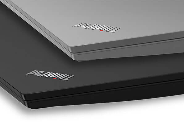 Two Lenovo ThinkPad E590 laptops stacked, showing both Silver and Black.