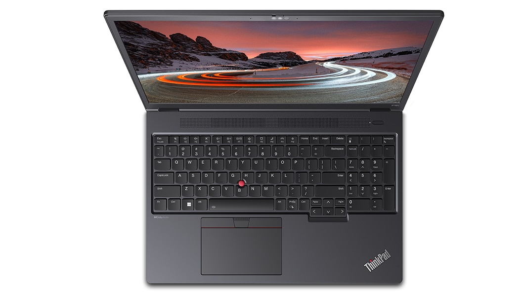 Aerial view of Lenovo ThinkPad P16v (16” Intel) mobile workstation, opened, showing full keyboard & display with Windows 11 start-up screen with a mountain image