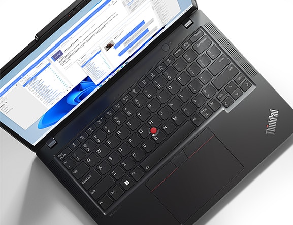 Overhead shot of tone-matched keyboard & trackpad on the Lenovo ThinkPad X13 Gen 4 laptop. 