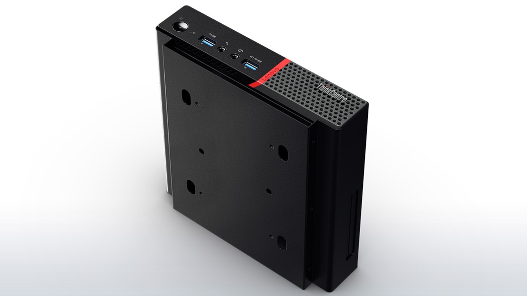 Lenovo ThinkCentre M700 Tiny, standing vertical on back, showing bottom mounting slots