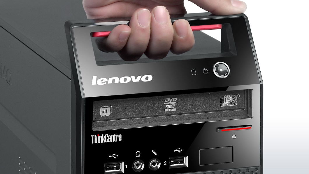 Lenovo ThinkCentre E73 Mini Tower, front detail view of hand gripping integrated carry handle