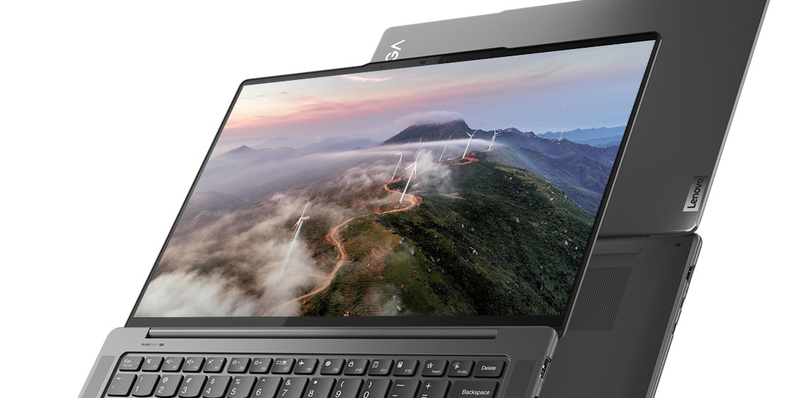 Top and bottom views of the Lenovo Yoga Pro 7 Gen 8 (13” AMD) 2-in-1 laptop opened 180 degrees, with an image of windmills along a mountain pass on the display