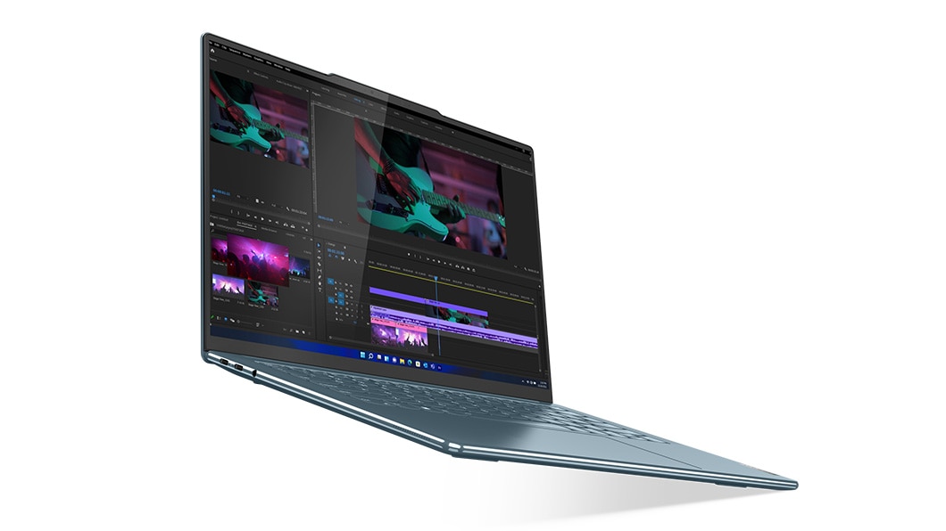 Yoga Slim 7 Gen 8 laptop facing right with video editing software on display 